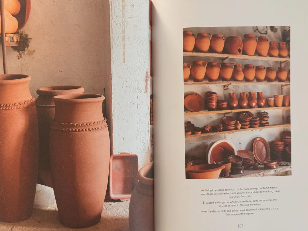 Terracotta pots and earthenware on shelves