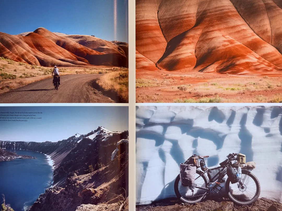 Painted red hills, a crater lake and a bike against wind-sculpted snow